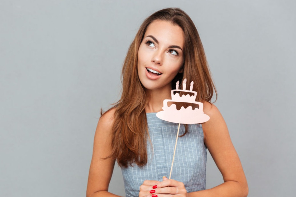 joyful-woman-with-birthday-cake